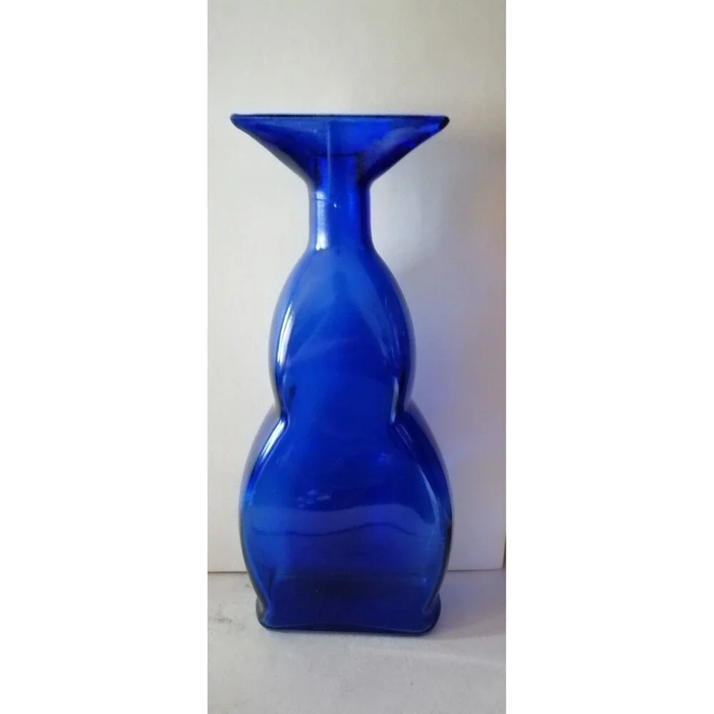 Cobalt blue bottle marked 
